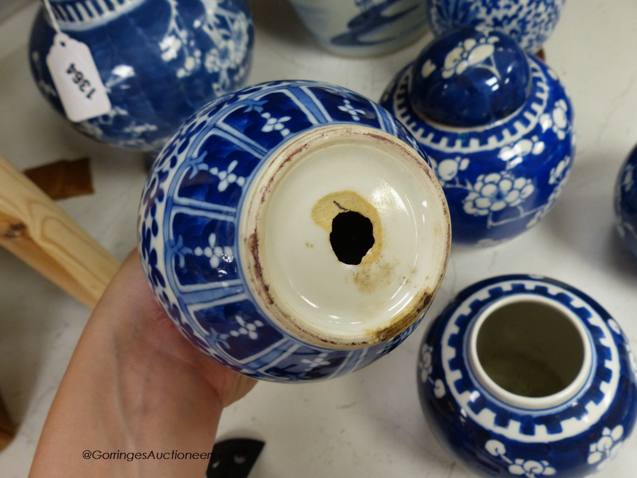 Ten 19th / 20th century Chinese blue and white vases and jars, tallest 29cm including cover